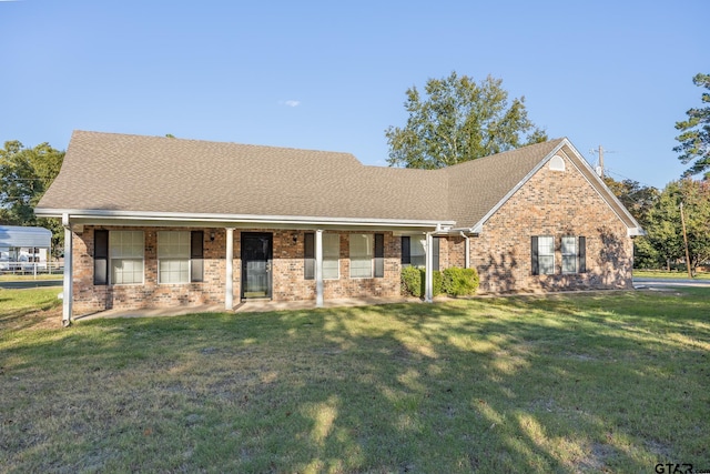 view of front of house with a front lawn