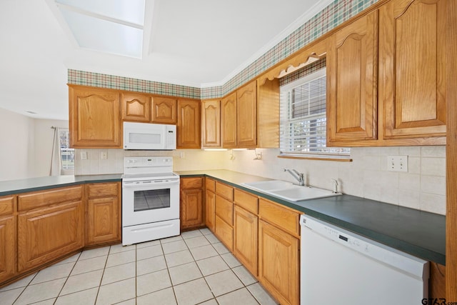 kitchen with sink, light tile patterned flooring, crown molding, backsplash, and white appliances