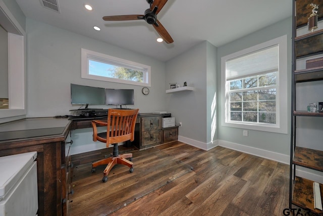 office space featuring dark hardwood / wood-style floors and ceiling fan