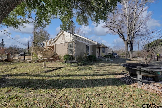 view of home's exterior featuring a lawn