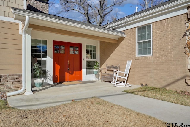 property entrance with a porch