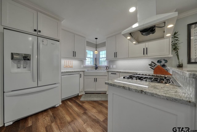 kitchen featuring sink, white cabinetry, white appliances, crown molding, and island exhaust hood