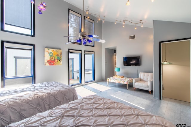 bedroom featuring high vaulted ceiling and ceiling fan