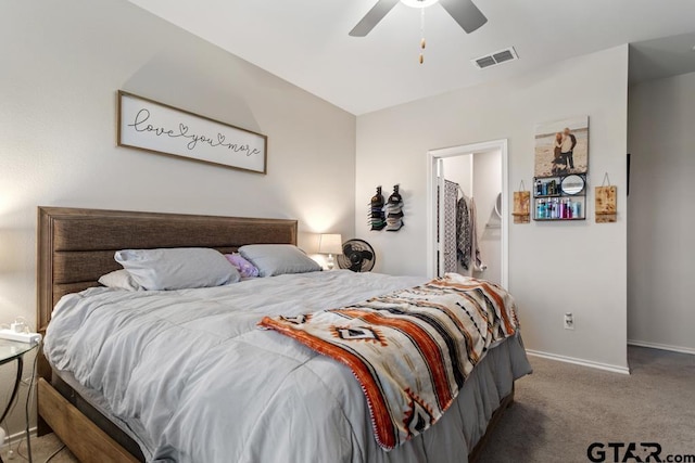 carpeted bedroom featuring visible vents, ceiling fan, and baseboards