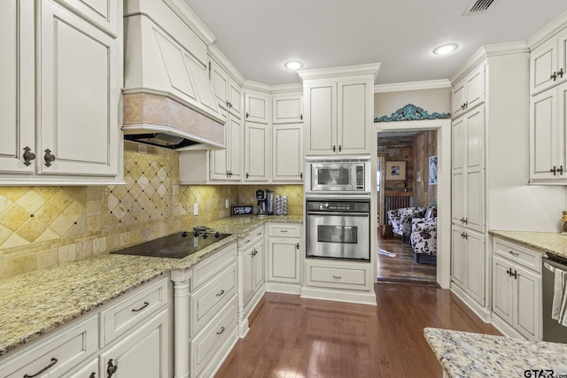 kitchen featuring custom exhaust hood, crown molding, light stone counters, dark hardwood / wood-style flooring, and stainless steel appliances