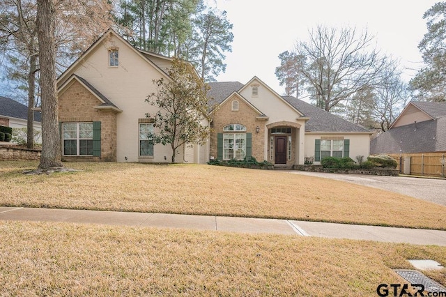 view of front property with a front lawn