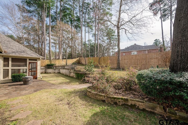 view of yard featuring a sunroom