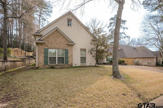 view of front property with a front lawn