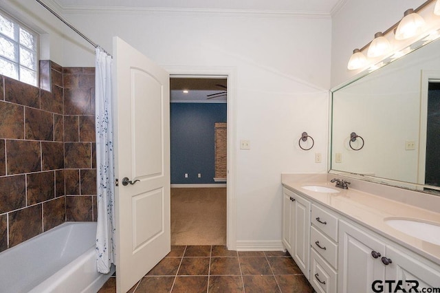 bathroom with tile patterned floors, ornamental molding, shower / bathtub combination with curtain, and vanity