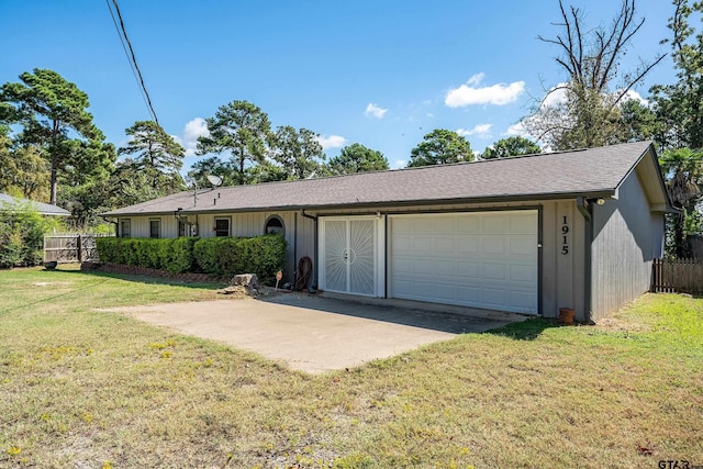 garage with a lawn