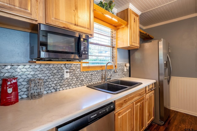 kitchen with backsplash, crown molding, sink, dark hardwood / wood-style flooring, and stainless steel appliances