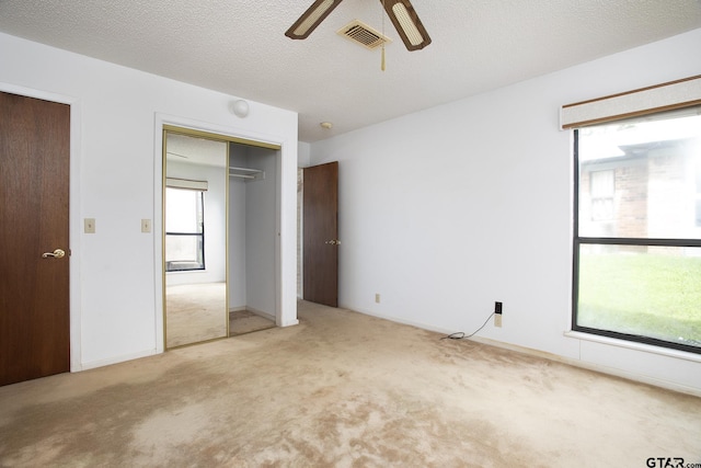2759 Lake Breeze Dr, Chandler, TX 75758 - unfurnished bedroom featuring carpet flooring and a ceiling fan