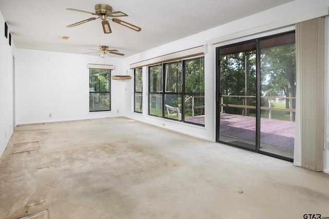 2759 Lake Breeze Dr, Chandler, TX 75758 - unfurnished room with ceiling fan, carpet flooring, and baseboards