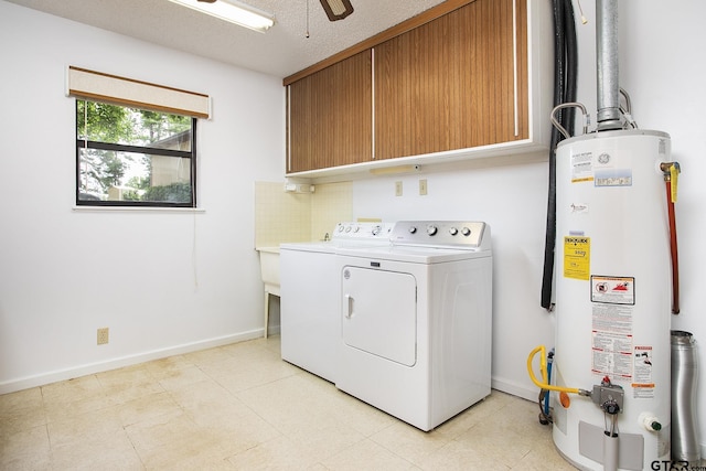 2759 Lake Breeze Dr, Chandler, TX 75758 - laundry area with gas water heater, washer and dryer, cabinet space, a ceiling fan, and baseboards