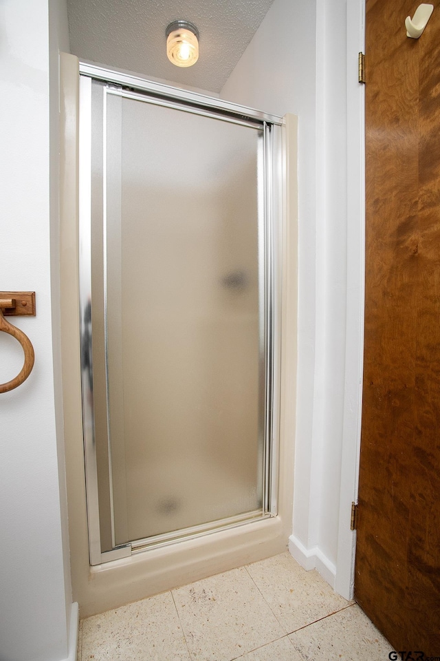 2759 Lake Breeze Dr, Chandler, TX 75758 - full bath with a shower stall and baseboards