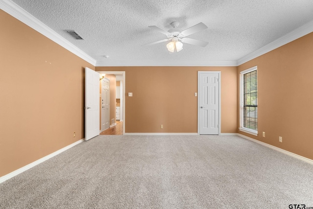 507 Hyde Park, Tyler, TX 75701 - carpeted empty room featuring ornamental molding, ceiling fan, and a textured ceiling