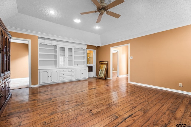 507 Hyde Park, Tyler, TX 75701 - unfurnished living room with a textured ceiling, hardwood / wood-style floors, crown molding, a ceiling fan, and recessed lighting