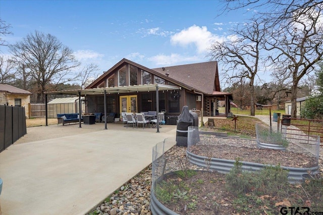 back of house featuring an outdoor hangout area and a patio area