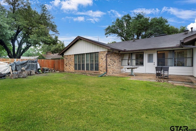 800 Neches Dr, Tyler, TX 75702 - rear view of property featuring a patio and brick siding
