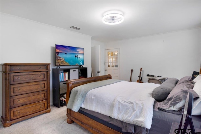 800 Neches Dr, Tyler, TX 75702 - bedroom featuring light carpet and ornamental molding