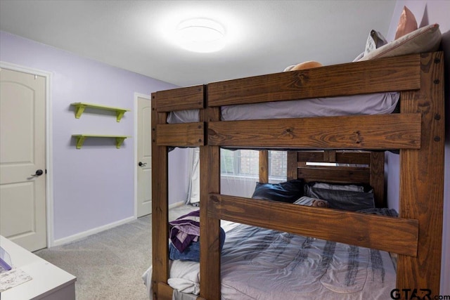 800 Neches Dr, Tyler, TX 75702 - bedroom with carpet flooring and baseboards