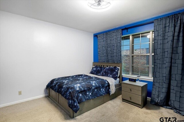 800 Neches Dr, Tyler, TX 75702 - carpeted bedroom featuring baseboards
