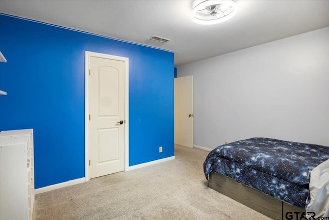 800 Neches Dr, Tyler, TX 75702 - bedroom with carpet flooring and baseboards