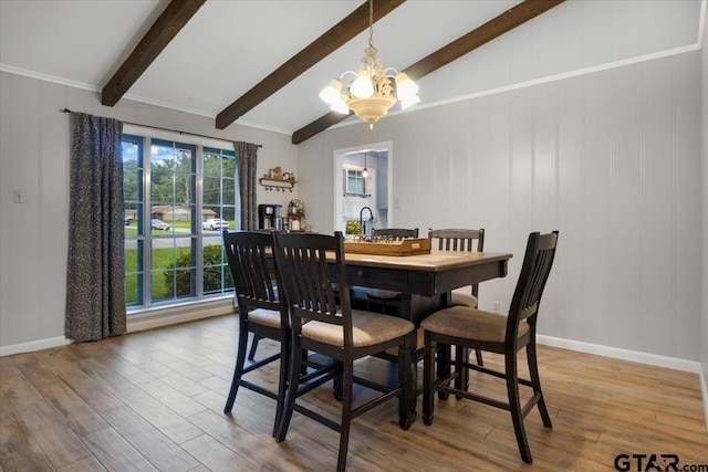 800 Neches Dr, Tyler, TX 75702 - dining area featuring a chandelier and wood finished floors