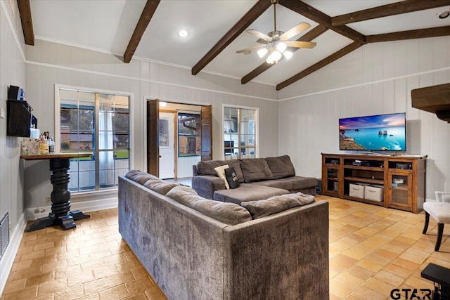 800 Neches Dr, Tyler, TX 75702 - living room featuring a ceiling fan, plenty of natural light, and a decorative wall