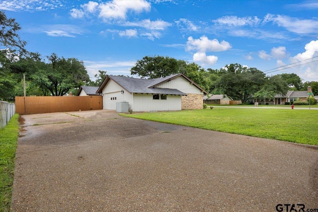 800 Neches Dr, Tyler, TX 75702 - view of property exterior with driveway and a garage