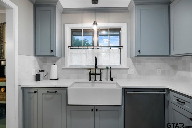 800 Neches Dr, Tyler, TX 75702 - kitchen with dishwashing machine, gray cabinetry, backsplash, ornamental molding, and light countertops