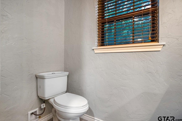 800 Neches Dr, Tyler, TX 75702 - half bathroom with toilet and baseboards