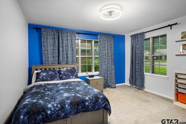 800 Neches Dr, Tyler, TX 75702 - carpeted bedroom featuring baseboards
