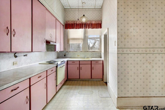 kitchen featuring pendant lighting and sink