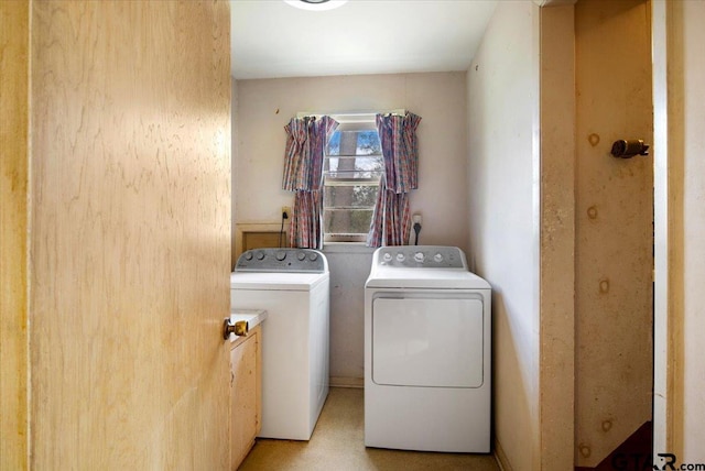 laundry area featuring washer and clothes dryer