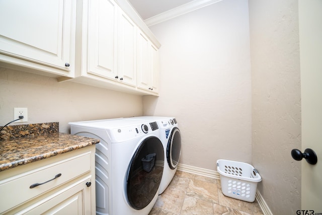 washroom with washer and clothes dryer, cabinets, and ornamental molding