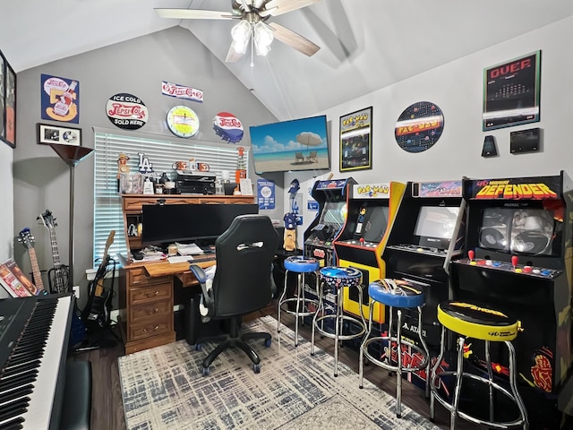 home office featuring ceiling fan, vaulted ceiling, and hardwood / wood-style floors