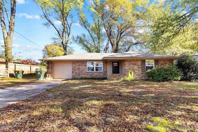 single story home featuring a garage