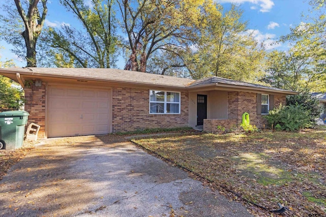 single story home with a garage