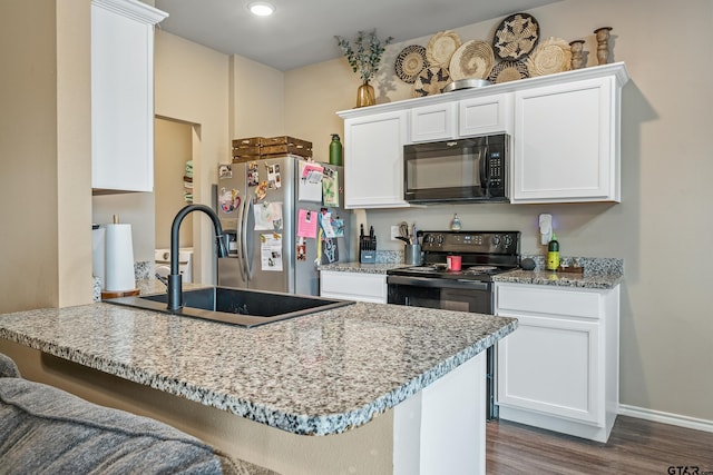109 Summit Cv, Jacksonville, TX 75766 - kitchen featuring black appliances, a sink, dark wood-style flooring, white cabinetry, and baseboards