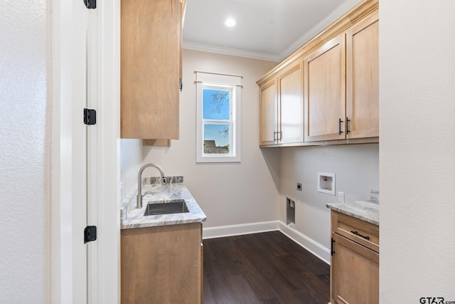 laundry area featuring cabinets, dark hardwood / wood-style flooring, sink, electric dryer hookup, and crown molding