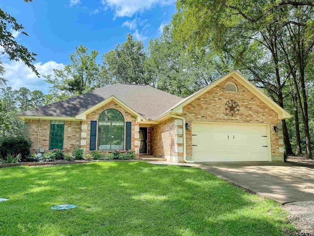 414 Winding Ln, Mount Vernon, TX 75457 - single story home featuring brick siding, an attached garage, concrete driveway, a front yard, and roof with shingles