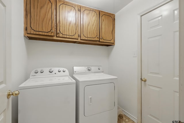 414 Winding Ln, Mount Vernon, TX 75457 - laundry room with washing machine and dryer and cabinet space