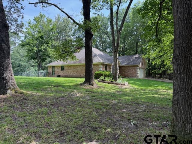 414 Winding Ln, Mount Vernon, TX 75457 - view of front of property with a garage
