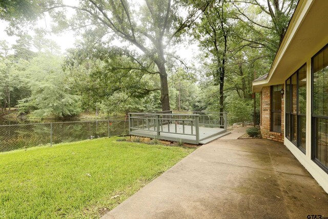 414 Winding Ln, Mount Vernon, TX 75457 - view of yard with a deck and a patio
