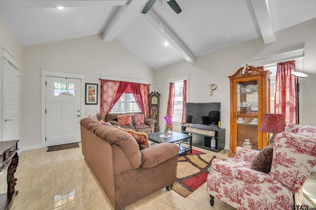 living room with lofted ceiling with beams, a ceiling fan, and baseboards