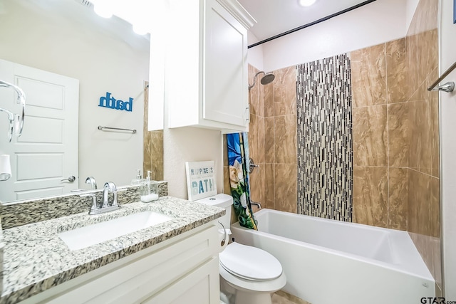 bathroom featuring shower / bathtub combination, vanity, and toilet