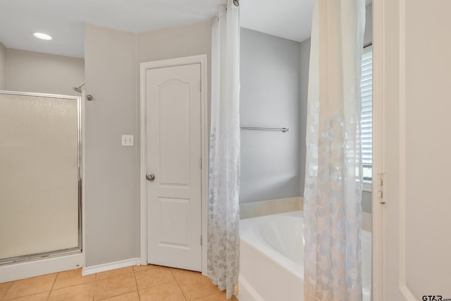 10820 Cactus Trl, Flint, TX 75762 - full bathroom with a shower stall, a bath, and tile patterned floors