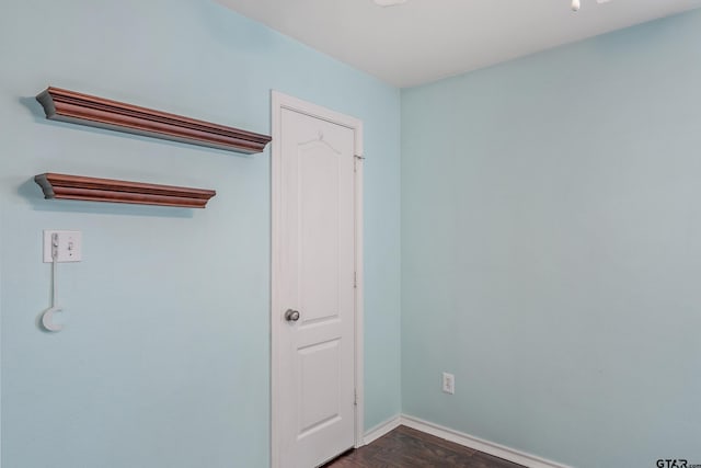 10820 Cactus Trl, Flint, TX 75762 - unfurnished bedroom with dark wood-type flooring and baseboards