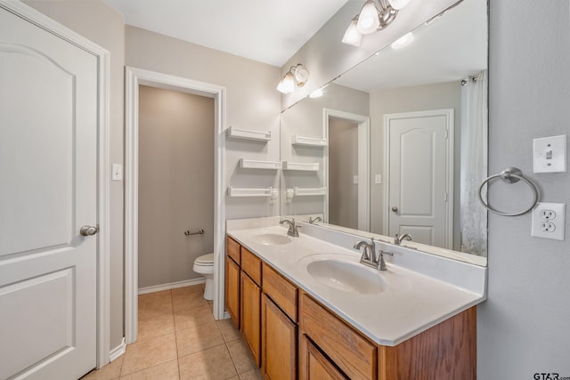 10820 Cactus Trl, Flint, TX 75762 - bathroom with double vanity and tile patterned flooring